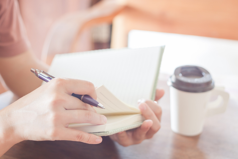 Woman Working at a Cafe 